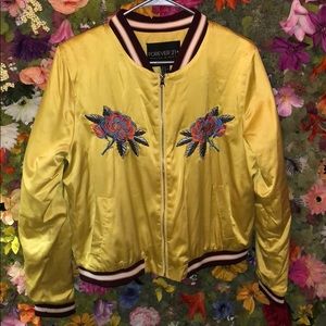 Embroidered yellow bomber jacket